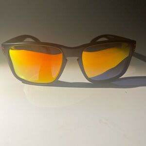Oakley Sunglasses with Black Frame and Orange Lenses
